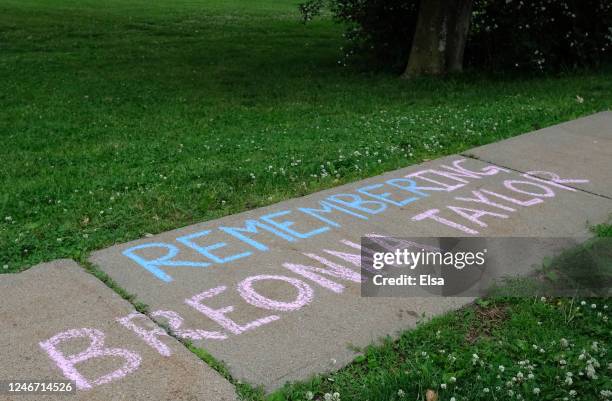 Message is written on the sidewalk along side the park where a candlelight vigil in memory of Breonna Taylor at Memorial Park on June 05, 2020 in...