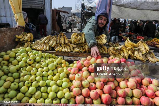 Seller prepares products for sale at his counter at the public market as daily life continues in Rafah, Gaza on February 01, 2023. Palestinians, who...