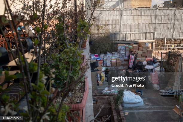 Iranian volunteers collect and adjust people's donations for helping victims of earthquake in the border city of Khoi, in the RooBeRoo mansion cafe...