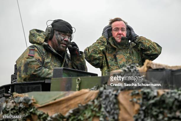 German Defence Minister Boris Pistorius rides in a Leopard 2 A6 main battle tank during a visit to the Bundeswehr's Panzerbataillon 203 tank squadron...
