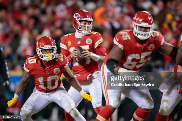 Kansas City Chiefs quarterback Patrick Mahomes behind the line during the game against the Cincinnati Bengals on January 29th, 2023 at Arrowhead...