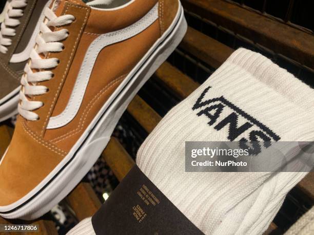 Vans socks and shoes are seen in a store in Krakow, Poland on February 1, 2023.