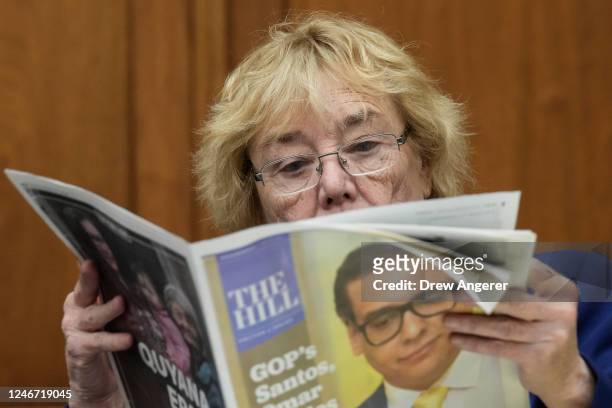 Rep. Zoe Lofgren reads The Hill newspaper with a picture of Rep. George Santos on the cover during a break in a hearing on U.S. Southern border...
