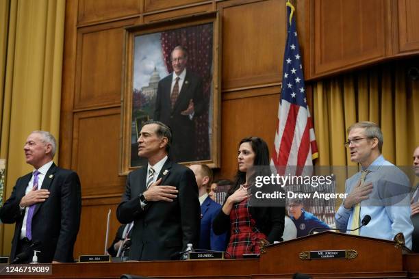 Rep. Ken Buck , U.S. Rep. Darrell Issa , a staff member and U.S. Rep. Jim Jordan , Chairman of the House Judiciary Committee, stand for the Pledge of...