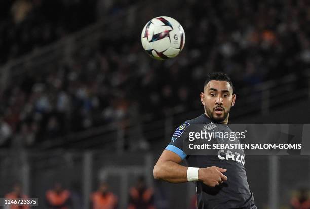Marseille's French forward Dimitri Payet heads the ball during the French L1 football match between FC Nantes and Olympique Marseille at the Stade de...