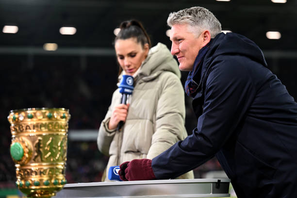 Esther Sedlaczek and Bastian Schweinsteiger Looks on prior to the DFB Cup round of 16 match between 1. FSV Mainz 05 and FC Bayern München at MEWA...