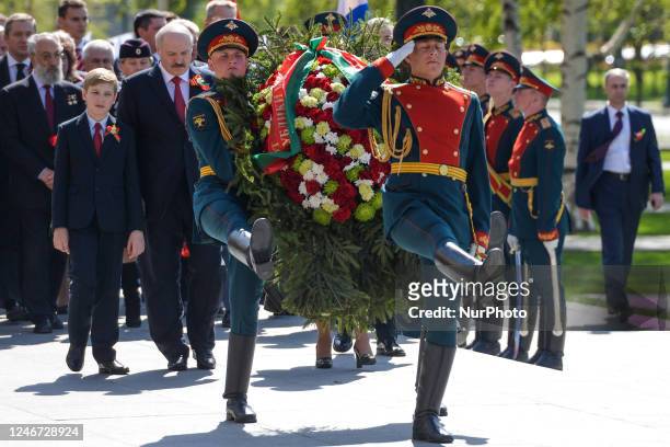 In this file picture, the President of Belarus, Alexander Lukashenko, and the First Lady, Galina , with their son Dmitry, arrives at the Tomb of the...