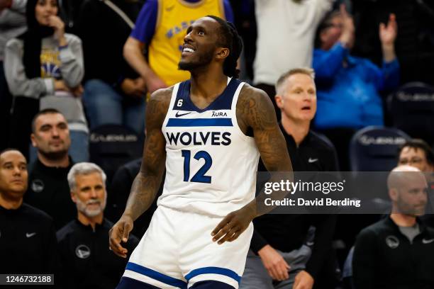 Taurean Prince of the Minnesota Timberwolves celebrates his three-point basket against the Golden State Warriors during overtime at Target Center on...