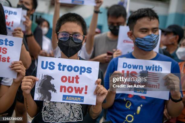 Activists stage a protest outside the gates of Camp Aguinaldo main military camp on February 2, 2023 in Manila, Philippines. US Defence Secretary...