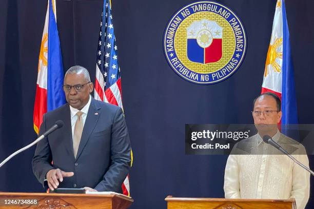 Defense Secretary Lloyd Austin III talks beside his Philippine counterpart, Carlito Galvez Jr. At a joint press conference in Camp Aguinaldo military...