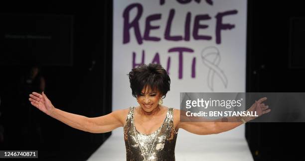 British singer Dame Shirley Bassey walks down the catwalk during Naomi Campbell's 'Fashion for Relief Haiti' fashion show at Somerset House in London...