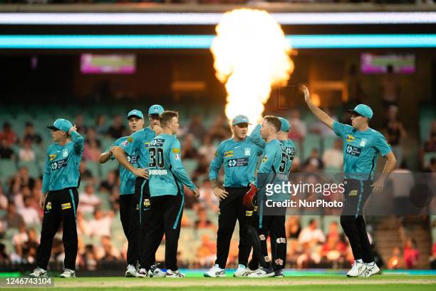 Matt Kuhnemann of the Heat celebrates with team mates after taking the wicket of JDaniel Hughes of the Sixers during the Men's Big Bash League match...
