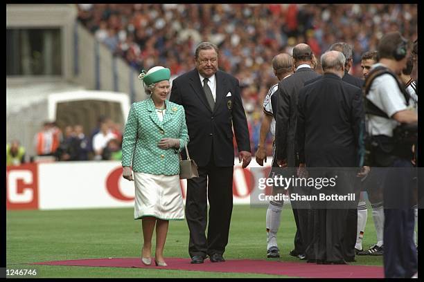 The Queen and Lennart Johannsen the president of U.E.F.A during the European nations soccer championships final match between the Czech Republic and...