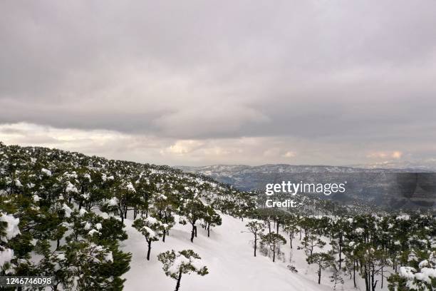 This aerial picture taken on February 2 shows snow covered mountains in the village of Saoufar, east of Beirut.