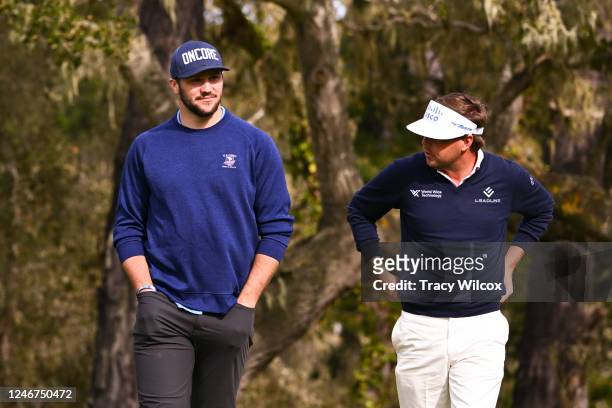 Buffalo Bills quarterback, Josh Allen and Keith Mitchell leave the seventh green during the first round of the AT&T Pebble Beach Pro-Am at Spyglass...