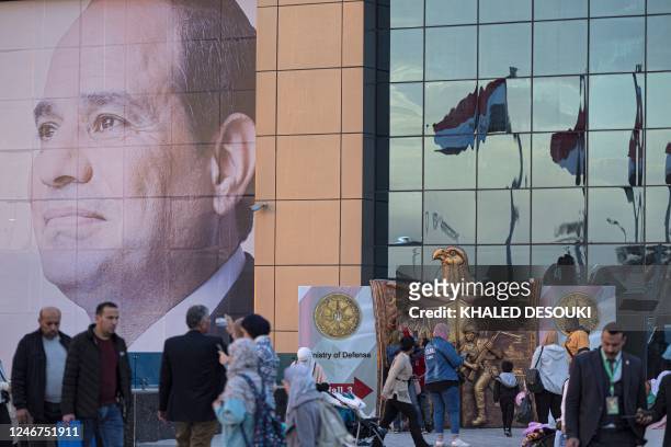 In this picture taken on January 29 a portrait of Egyptian President Abdel Fattah al-Sisi adorns the venue of the 54th Cairo International Book Fair...