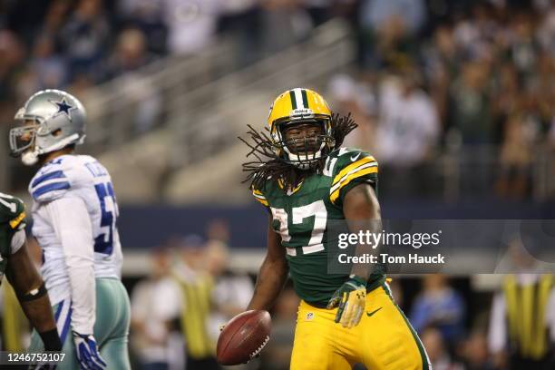 Green Bay Packers running back Eddie Lacy spikes the ball after scoring the game winning touchdown during the Green Bay Packers against the Dallas...