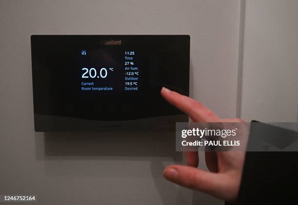 Temperature controller shows the internal and external temperatures, inside a house built to develop future heating solutions at Energy House 2.0 at...