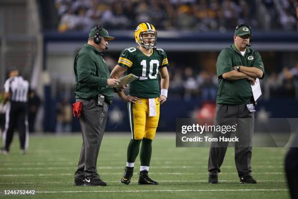 Green Bay Packers quarterback Matt Flynn speaks with Green Bay Packers head coach Mike McCarthy during the Green Bay Packers against the Dallas...
