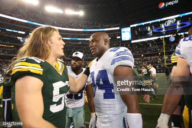 Dallas Cowboys defensive end DeMarcus Ware speaks with Green Bay Packers linebacker Clay Matthews after the Green Bay Packers against the Dallas...