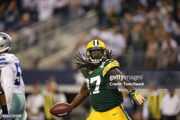 Green Bay Packers running back Eddie Lacy spikes the ball after scoring the game winning touchdown during the Green Bay Packers against the Dallas...