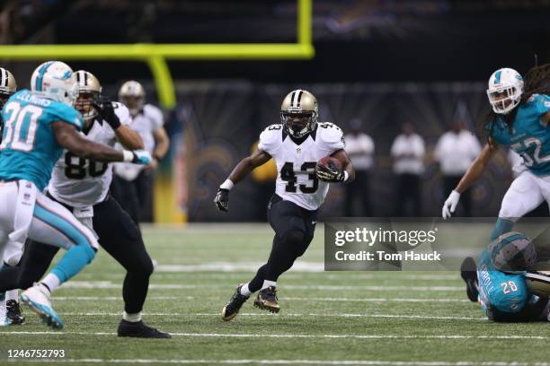 New Orleans Saints running back Darren Sproles runs with ball during the Miami Dolphins against the New Orleans Saints NFL football game Monday,...