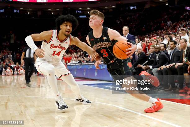 Justice Sueing of the Ohio State Buckeyes defends against Connor Essegian of the Wisconsin Badgers during the second half of the game at the Jerome...