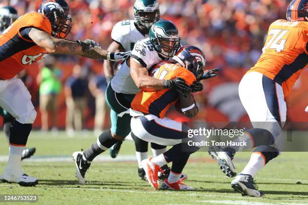 Denver Broncos running back Ronnie Hillman gets tackled by Philadelphia Eagles inside linebacker Mychal Kendricks during the Philadelphia Eagles...