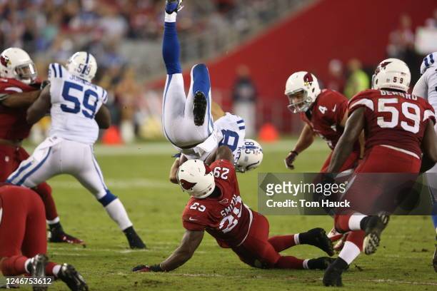 Indianapolis Colts wide receiver David Reed is upended returning a kick by Arizona Cardinals Alfonso Smith during an NFL game between the...