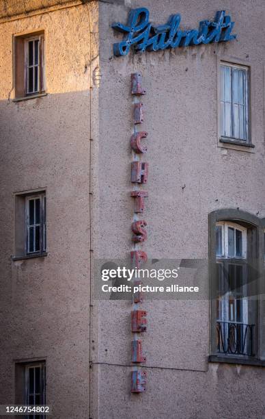 January 2023, Mecklenburg-Western Pomerania, Sassnitz: The advertising sign "Lichtspiele" hangs on the facade of the listed former cultural center...