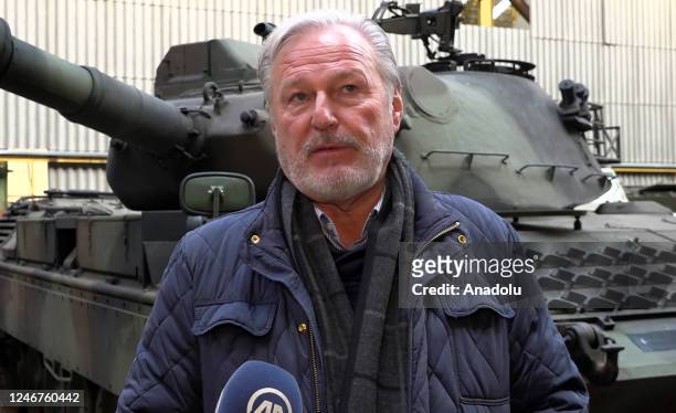 Of OIP Land Systems Freddy Versluys speaks to Anadolu Agency in front of German-made Leopard 1 tanks, which were removed from the Belgian army's...