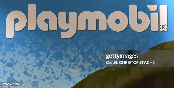 The logo of German toy company Playmobil is seen at the 72th toy fair in Nuremberg, southern Germany, on February 2, 2023.