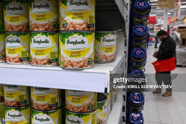 This photograph taken on February 3 shows Bonduelle bean cans in a supermarket in Moscow.