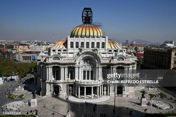 View taken on February 2, 2023 of the Fine Arts Palace in Mexico City. - Mexico City is attracting a rising number of tourists and foreigners who...