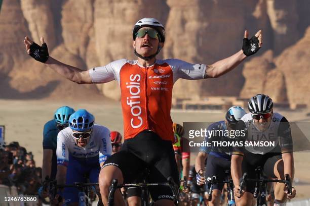 Team Cofidis' Italian cyclist Simone Consonni reacts after winning the fifth stage of the 2023 Saudi Tour, from Al-Ula Old Town to Maraya on February...