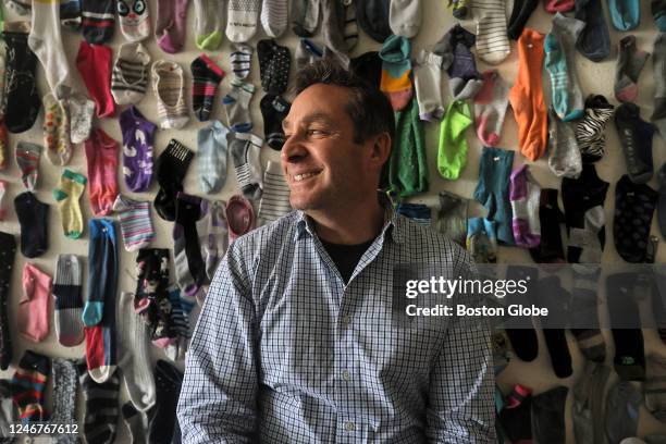 Northampton, MA Jason Foster, owner of Northamptons Masonic Street Laundry, keeps a gallery of lost socks on a wall, and displays art from nearby...