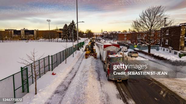 Aerial picture of snow removal operation in Montreal, Quebec, Canada, on January 27, 2023. - In just a few hours, tons of snow is removed from...