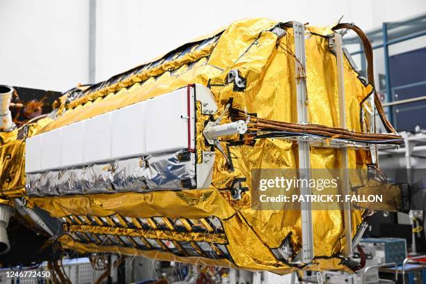 The NISAR satellite, a joint Earth-observing mission between NASA and the Indian Space Research Organization , is displayed inside a clean room at...