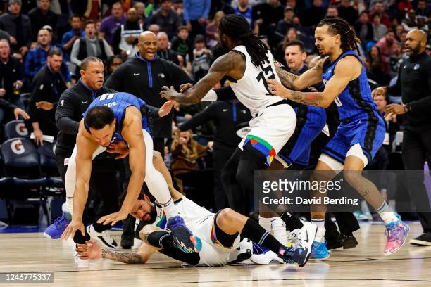 Jalen Suggs of the Orlando Magic gets into a scrum with Austin Rivers of the Minnesota Timberwolves in the third quarter of the game at Target Center...