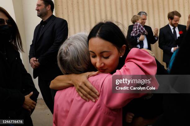 Kristenne Reidy, daughter of Valentino Alvero, gets a hug after the funeral of her father. Funeral services were held for Valentino Alvero, one of...