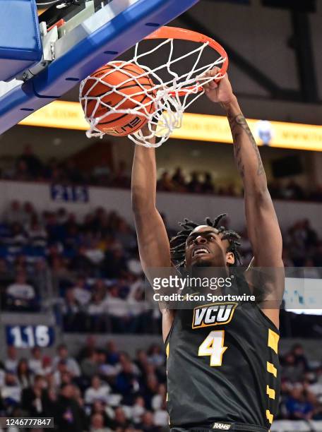Forward Jalen DeLoach dunks the ball in the first half during a college basketball game between the VCU Rams and the Saint Louis Billikens on...