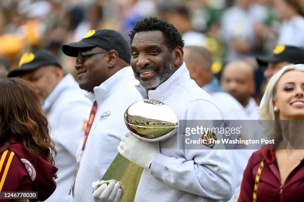 Former Washington quarterback and MVP of the 1988 Super Bowl Doug Williams holds the Super Bowl Trophy from that year at FedEx Field October 23, 2022...