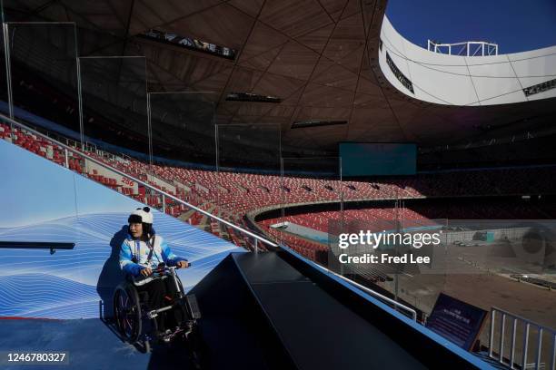 Women visits the National Stadium, also known as the Bird's Nest, as China marks the one-year anniversary of Beijing 2022 on February 4, 2023 in...