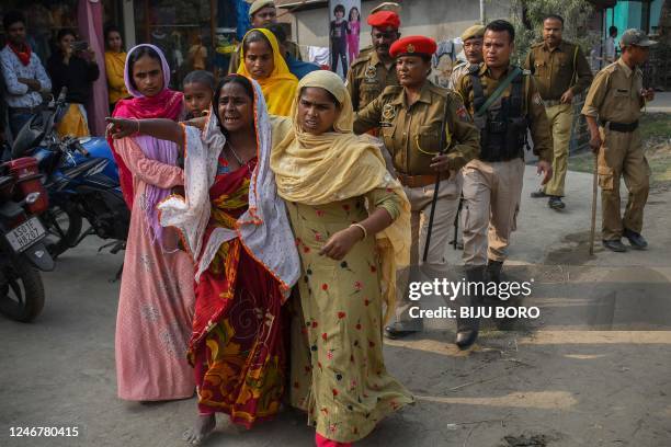 People react after police arrested their relatives allegedly involved in child marriages, during Assam government's state-wide crackdown on child...