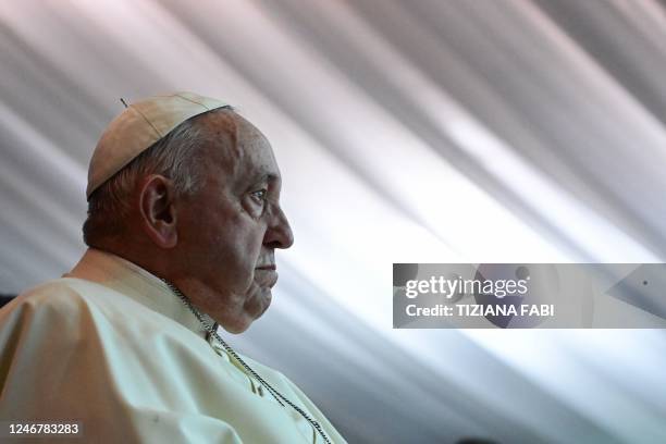 Pope Francis looks on during a meeting with internally displaced persons at the Freedom Hall in Juba, South Sudan, on February 4, 2023. - Pope...