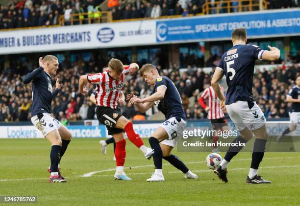 Joe Gelhardt of Sunderland takes on the Millwall defence during the Sky Bet Championship match between Millwall FC and Sunderland AFC at The Den, on...