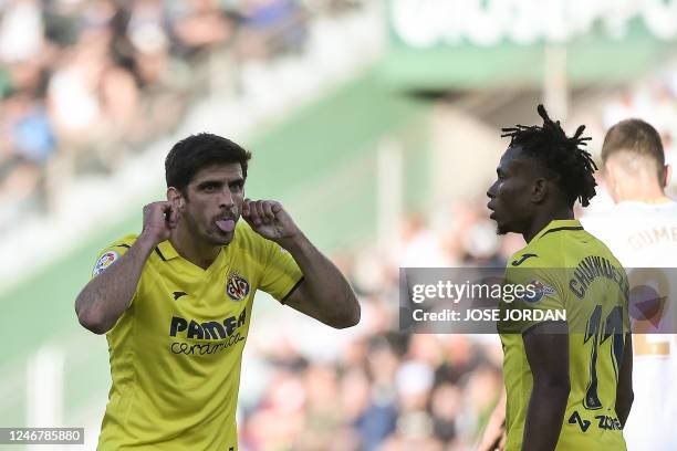 Villarreal's Spanish forward Gerard Moreno celebrates after scoring his team's first goal during the Spanish league football match between Elche CF...