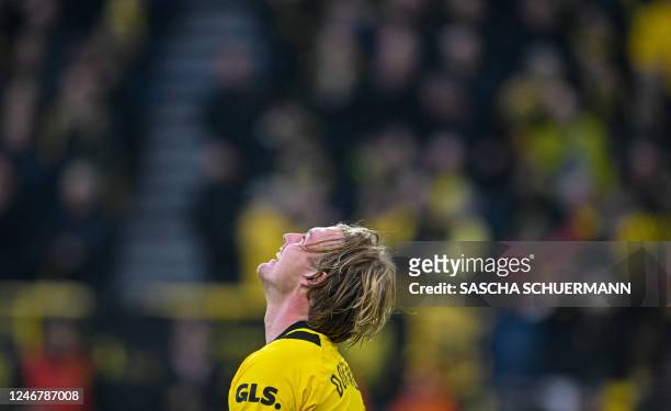Dortmund's German midfielder Julian Brandt celebrates scoring the 4-1 goal during the German first division Bundesliga football match between...