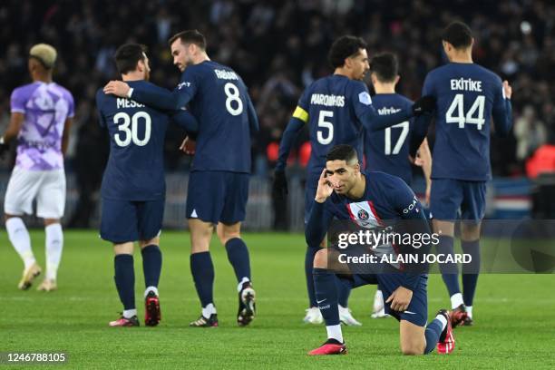 Paris Saint-Germain's Moroccan defender Achraf Hakimi celebrates after scoring his team's first goal during the French L1 football match between...