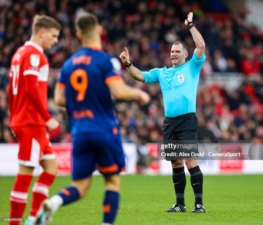 Referee Tim Robinson rules out Blackpool's Jerry Yates goal during ...